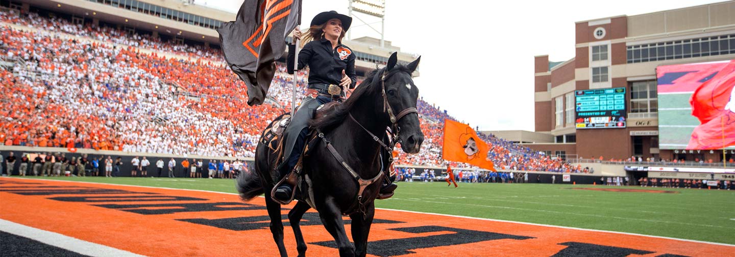 Student riding horse